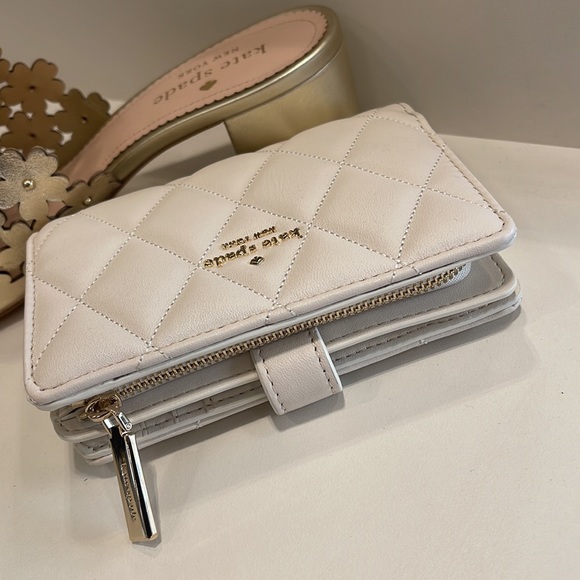 Kate Spade Carey Medium Compartment Bifold Wallet 
COLOR: Parchment - Picture 14 of 16
